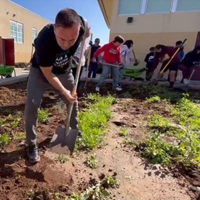 Volunteers work to build a Sustainability Center and Community Garden and at Southwest Middle School