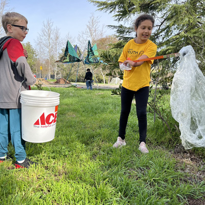 Children participate in the cleanup in the City of Davis 