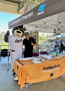 Stormwater booth with Dinger at Sacramento Rivercats Homestand